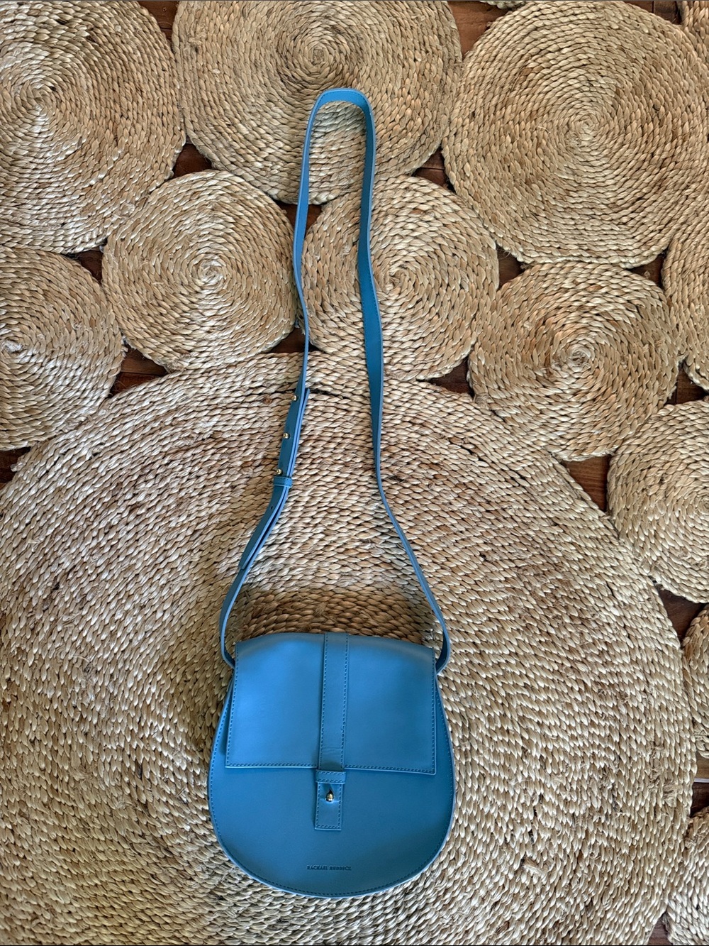 Light Blue Leather Crossbody Saddle Bag with Adjustable Strap